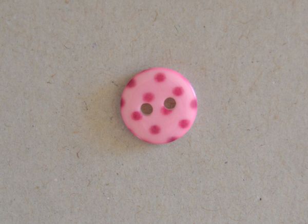 Bouton rose pois fuschia