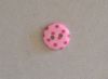 Bouton rose pois fuschia